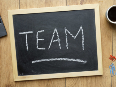 TEam written on a chalkboard at the office